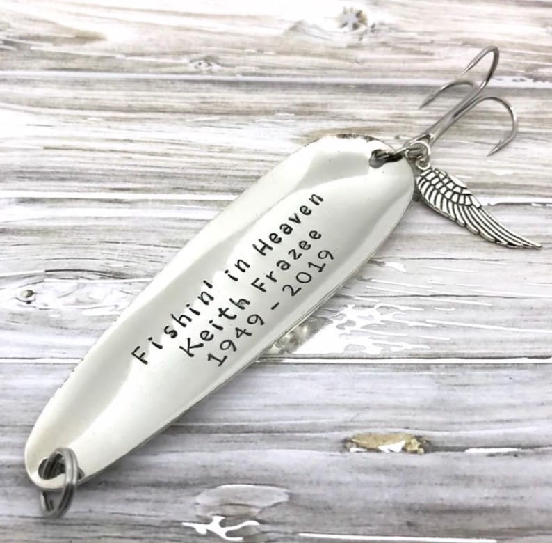 Personalized Fishin’ in Heaven memorial fishing lure with custom name and years, hand-stamped metal keepsake gift. Wing charm add-on.