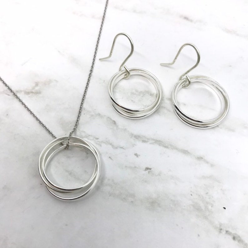 Trilogy rings sterling silver dangling earrings. A Etsy