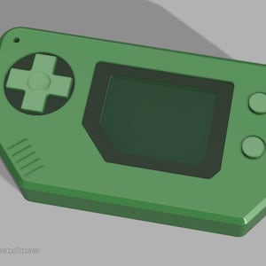 May include: A green handheld video game console with a cross-shaped directional pad, a screen, and two buttons.