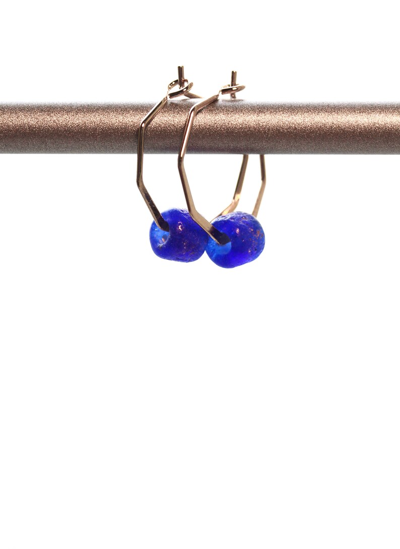 Earrings with small dark blue sea glass beads