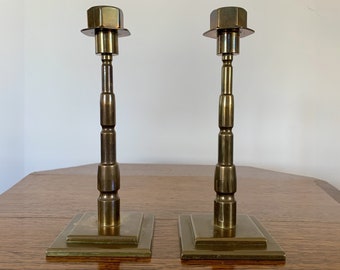 A stylish pair of Art Deco bronze candlesticks, c. 1930s/ 1940s