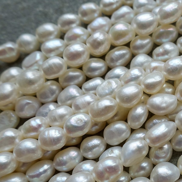 Hebras de perlas barrocas naturales de agua dulce, forma de pepita, color blanquecino