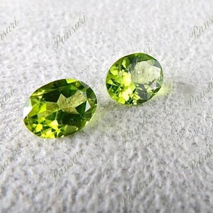 Natural Green Peridot Gemstones: Oval Cut Pair, 4.02 Carats