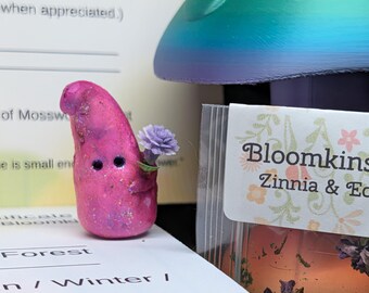 Handmade Bloomkin fairy helper figurine — a whimsical forest creature holding a magical flower