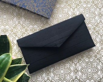 simple black clutch