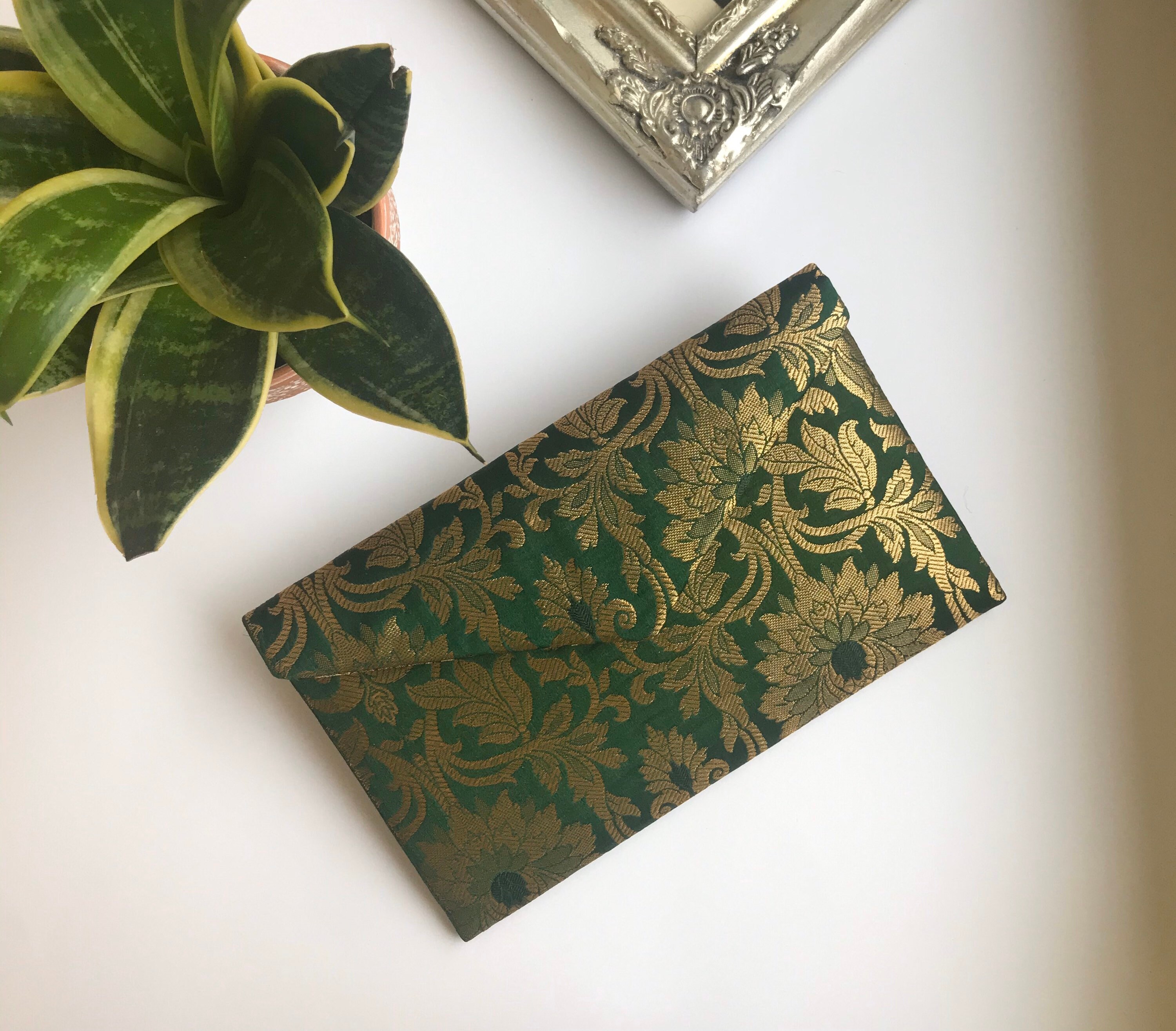 dark green evening bag