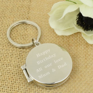 Silver Finish De Luxe Opening Round Shaped Keyring with Engraving, add your own photos inside.