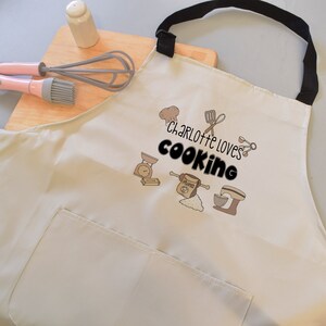 Personalised Name Loves Cooking with Utensils Design Stone Apron