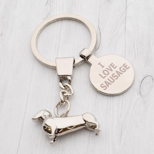 Personalizowany grawerowany brelok z jamnikiem w aksamitnym woreczku