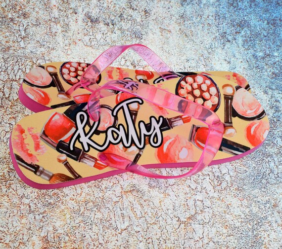 ladies pink flip flops
