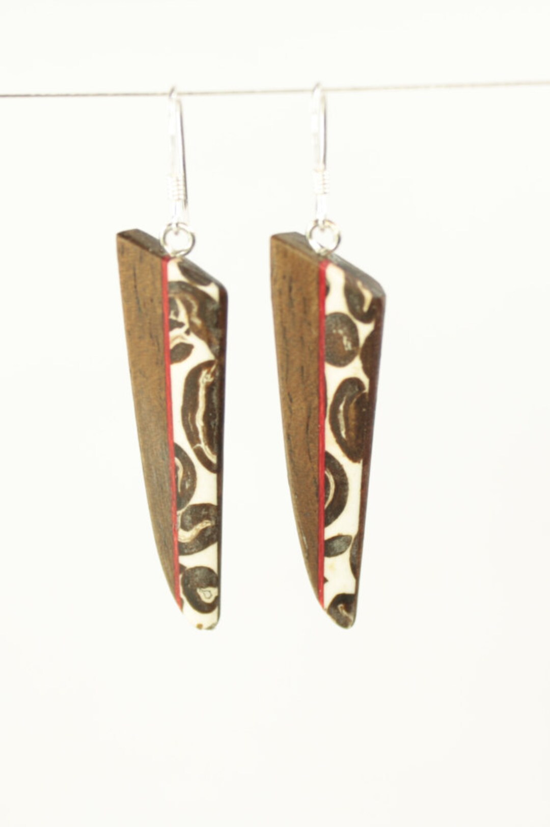 Non clearance conductive earrings
