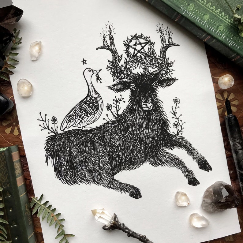 May include: Black and white pen and ink illustration of a black goat with a pentagram and candles on its antlers. A white bird with a long beak sits on the goat's back.