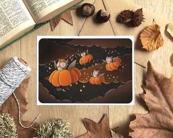 May include: A greeting card featuring a whimsical illustration of five owls flying through a starry night sky. Each owl is perched on a pumpkin, with the pumpkins flying through the air. The card has a dark blue background with white stars and clouds.