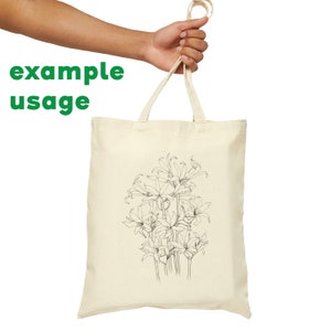 May include: A natural canvas tote bag with a black line drawing of a bouquet of flowers. The bag has two long handles.