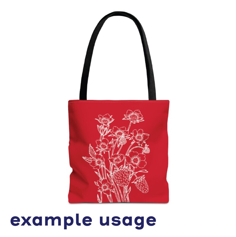 May include: Red tote bag with a white floral design featuring strawberries and flowers. The bag has black handles.
