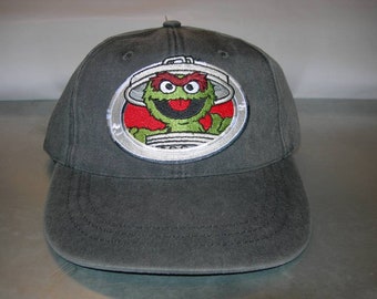 Sesame street Oscar vintage strap back cap new with tags Jim Henson productions  new with tags adult sizing by headstart caps