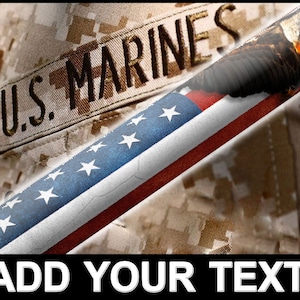 May include: A close-up of a camouflage fabric with the words "U.S. Marines" embroidered on it. A diagonal American flag with a bald eagle is superimposed over the fabric. The text "ADD YOUR TEXT" is at the bottom of the image.