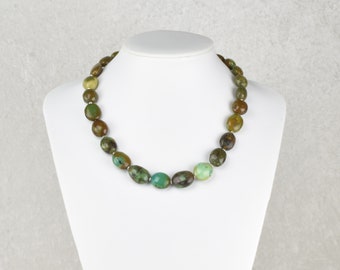 Necklace of turquoises in motherstone