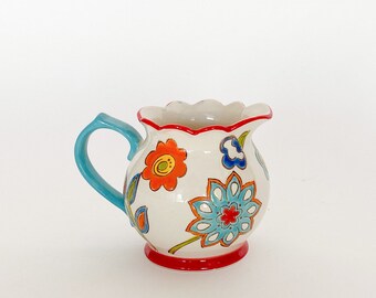 Ceramic Glazed Hand Crafted 14 oz. Colored Floral Blue Handle Creamer