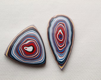 TWO Fordite Cabochon white red black mismatched
