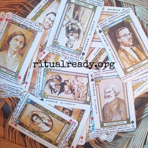 May include: A deck of playing cards featuring portraits of notable African American figures. Each card has a black and white illustration of a person with their name and a brief description. The cards are arranged in a pile, with some cards partially visible. The cards are part of a deck called "Human Rights".