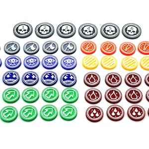 Peut inclure: Un ensemble de 60 jetons ronds en plastique avec différents symboles et numéros. Les jetons sont de différentes couleurs, notamment noir, gris, bleu, vert, jaune, orange et rouge.