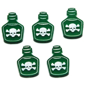 May include: Five green glass bottles with a white skull and crossbones design. The bottles are small and have a rounded shape.