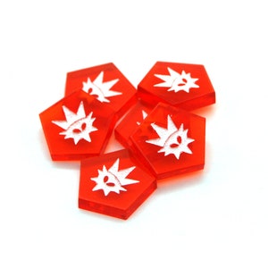 May include: Six red hexagonal game pieces with a white crown and star design.