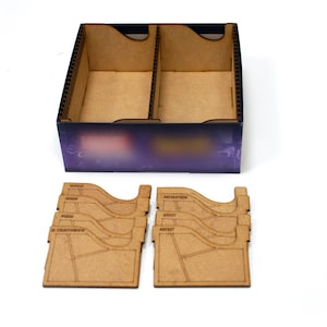 May include: A wooden box with a purple and black design, containing dividers for organising game components. The box is open and the dividers are visible. The dividers are made of wood and have a natural finish.