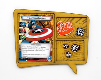 May include: A yellow and brown card game tray with a Captain America card, dice, and a "Tough" token. The card features a comic book image of Captain America holding his shield.