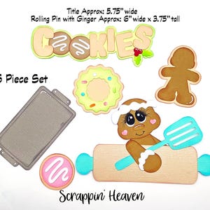 May include: A 6-piece set of paper cutouts with a cookie theme. Includes a rolling pin, gingerbread man, baking sheet, and cookies. The title "Cookies" is displayed in a playful font. The rolling pin is approximately 6 inches wide.