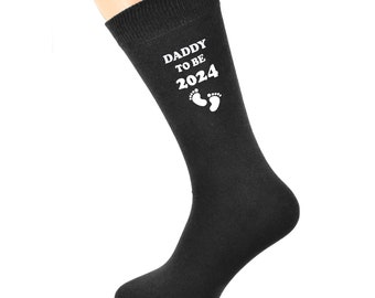 Daddy to Be 2024 with Footprint Design Printed in White Vinyl on Mens Black Cotton Rich Socks Great.   One Size, UK 8-12