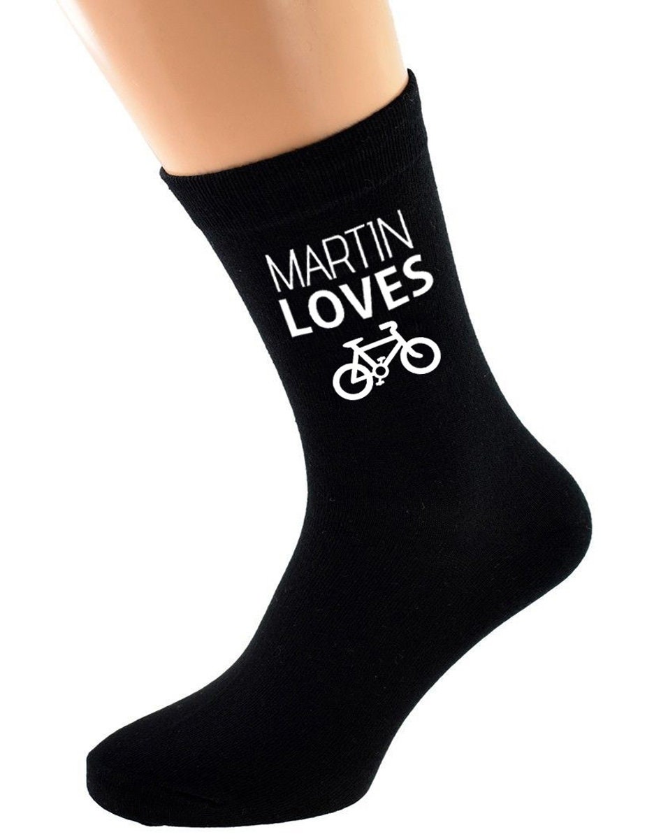 Personalised Name Loves Bicycle Bike Image Printed in White Vinyl On Mens Black Cotton Rich Socks Great. One Size, UK 8-12