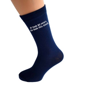 It took 80 years to look this good printed in White Vinyl on Mens NAVY BLUE Socks.  Great 80th Mens Birthday Gift