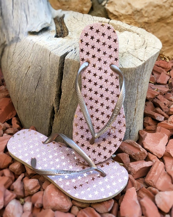 gold sparkly flip flops