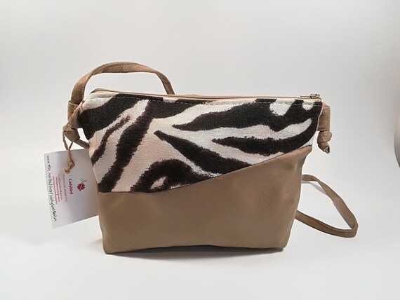 beige suede clutch