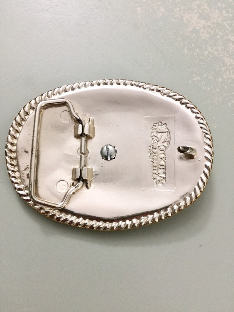 Vintage Belt Buckle Horse Head in Relief Fancy Scroll Work Beaded Edge by Nocona Buckles