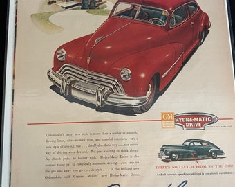 Vintage 1946 Oldsmobile Postwar Hydra-Matic Drive automobile ad Advertisement