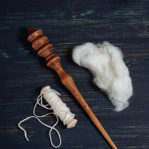 Long supported spindle, rus style, hardwood with oil