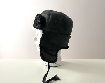 Ouchanka en agneau bouclé noir, chapeau en cuir véritable avec fourrure, chapeau d'hiver chaud, chapeau de trappeur avec cache-oreilles en agneau de Perse, idée cadeau accessoire traditionnel
