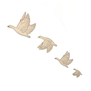 Quartet of Geese. Flight of wooden birds, laser cut.