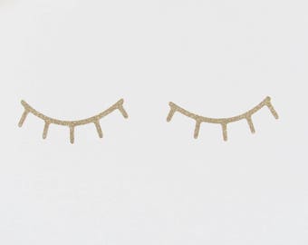 Big eyes, gold glitter stickers.
