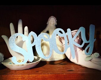 Vintage Halloween metal Spooky advertisement sign