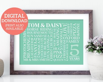 May include: A framed print with a light green background and white text. The text is arranged in a word cloud style and includes the names "Tom & Daisy" and the number "5". The text also includes words like "horse riding", "Bournemouth", "sun sand sea", "laughter", "hugs", "pink", "fizz", "Oxford", "family", "love", "forever", "pizza", and "wine".
