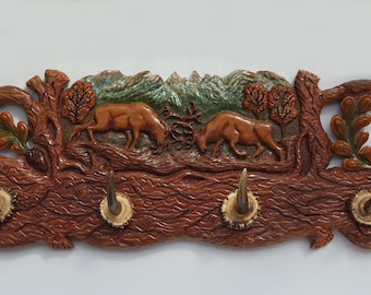 Wood carving hanger, Unique wall panel with antlers for the interior of a hunting lodge, restaurant, Sculpture engraving deer, Rila mountain