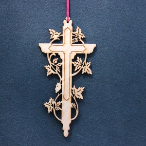 Cross with grapevine