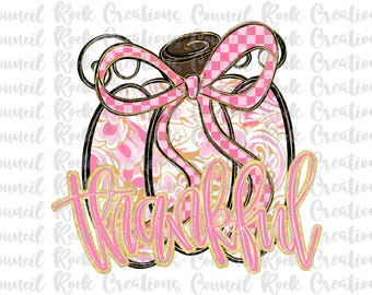May include: A digital graphic of a pumpkin with a pink and white floral design. The pumpkin has a brown stem and a pink checkered bow. The word "Thankful" is written in pink and gold script.