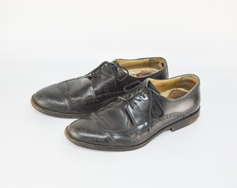 Zapatos brogue vintage Johnston & Murphy de cuero negro con punta de ala - Talla 46 (Reino Unido)