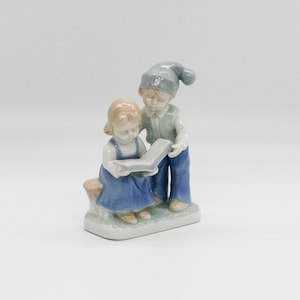 vintage Porcelain Figurine Girl and Boy Reading a Book / Japan art collectible sculpture blue and white color