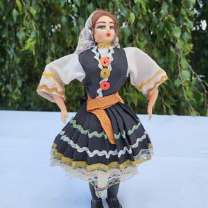 Vintage ethnic Doll girl in national costume / stuffed toy / hand painted face folk figurine